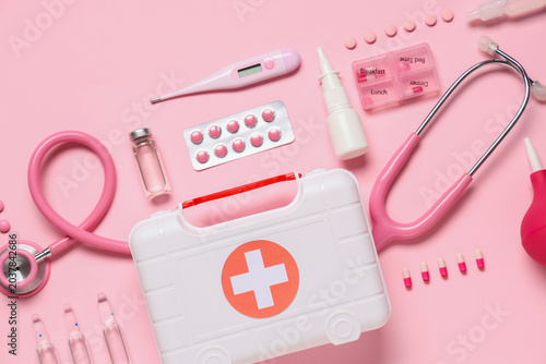 Pink medical flat lay with ...