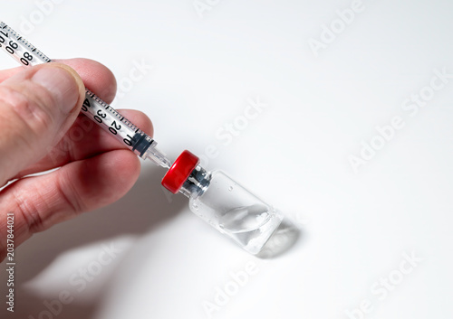 Peptides and syringe. Peptides are amino acids that are used in a myriad of medical ways from glucose control to battling inflammation.