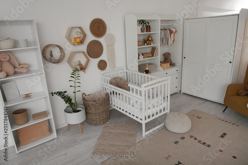 Interior of nursery with ba...