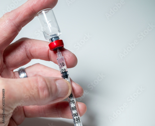 Peptides and syringe. Peptides are amino acids that are used in a myriad of medical ways from glucose control to battling inflammation.