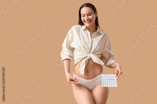 Young woman with menstrual ...