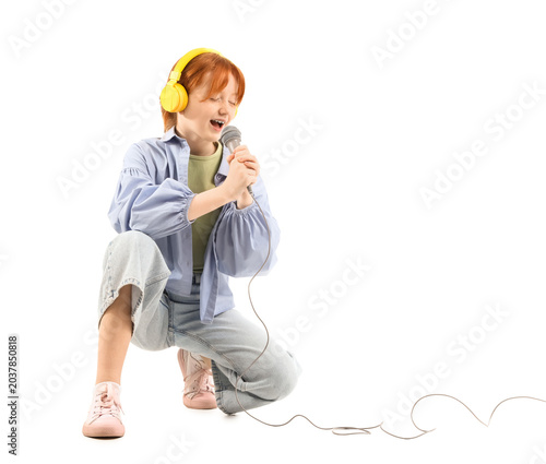 Teenage redhead girl in hea...