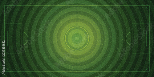 Tableau sur toile Top-down aerial view of a green soccer field with white markings, including the center circle, penalty areas, and goals