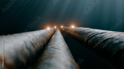 Subsea internet communication cable extending through dark water  