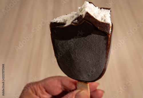 Canvas Print A close-up of a popsicle ice cream with a piece bitten out