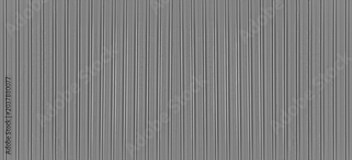 Fotografie Abstract seamless industrial corrugated silver metal sheet texture with a gray a
