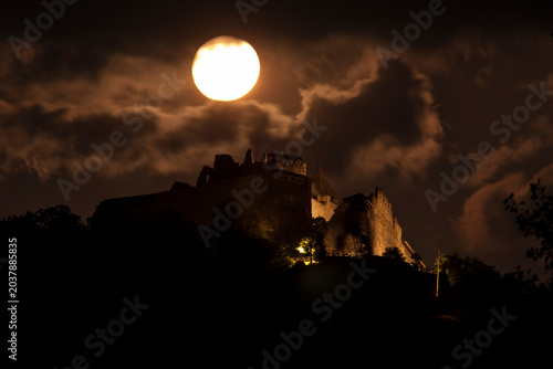 Obraz na płótnie ruins of a castle by full moon in Central Europe