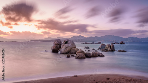 A beach in the sunset
