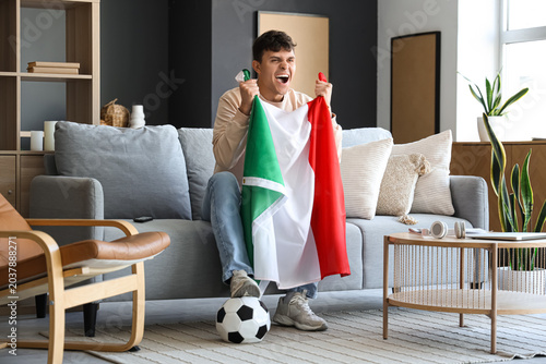 Young man with flag of Ital...