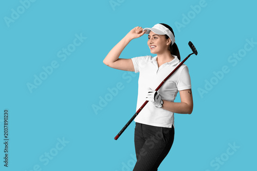 Beautiful female golfer on ...