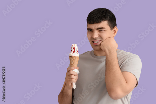 Young man with ice cream su...