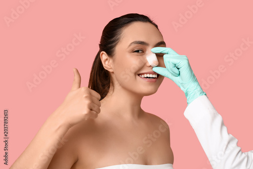 Plastic surgeon's hand and ...