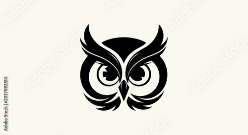 Black owl head silhouette on white background