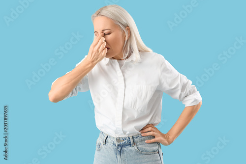 Mature woman suffering from...
