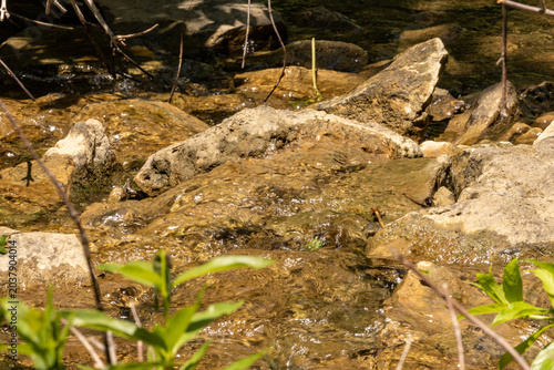 water flowing over rocks