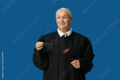 Mature female judge with ga...