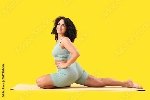 Sporty adult woman practici...