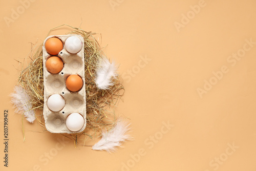 Chicken eggs in carton box ...