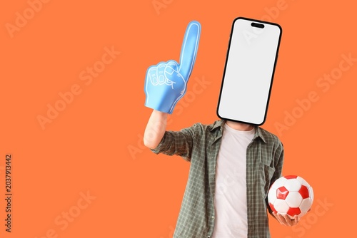 Male sports fan with soccer...