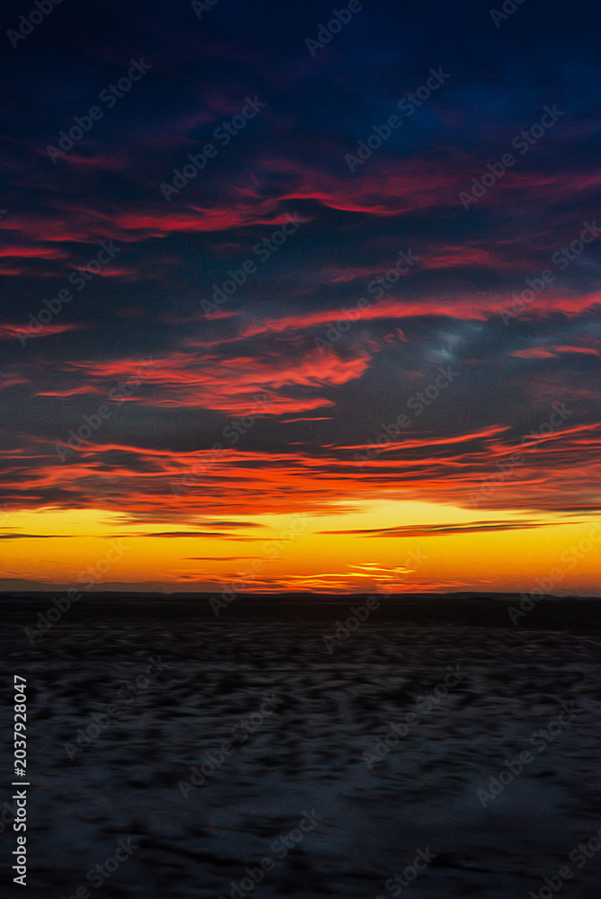 Fototapeta premium Vibrant sunset over a vast landscape with dramatic orange and purple clouds.
