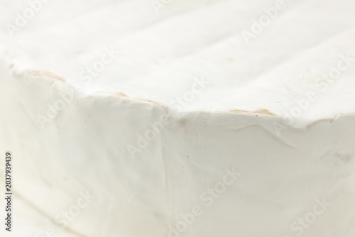 Fotografie Delicious brie cheese as background, closeup view