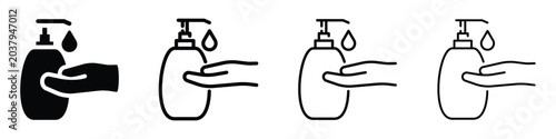 Tableau sur toile Hand sanitizer dispenser and drop of liquid being dispensed onto an open palm