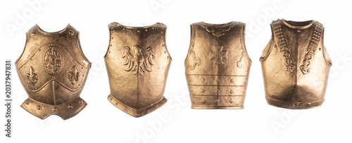 Photos golden knight armor on a white isolated background