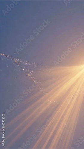 Magical glittering stardust trail moving through golden sunbeams against a serene blue sky, creating a divine light effect
