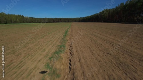 FPV Drone Flight Over Agricultural Field Boundary at High Speed