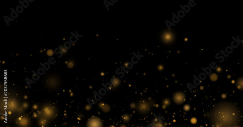 Golden glitter dust flows gently across a dark transparent space. Soft glowing particles create a luxurious festive atmosphere. Elegant abstract design.