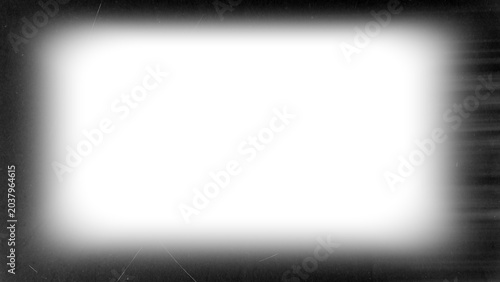 Tableau sur toile Vintage film border with dense, dark vignette, heavy dust, visible scratches, and film sprocket hole detail, surrounding a transparent center