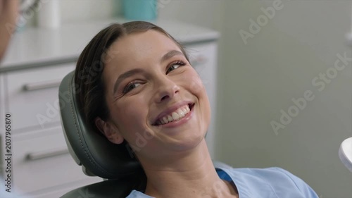Relaxed woman patient during dental treatment