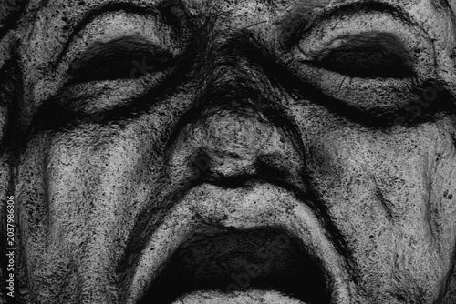 Schilderij op canvas Stone face of Phobos, ancient embodiment of fear and terror in Greek mythology