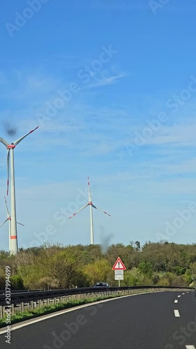 Wind turbines along highway road