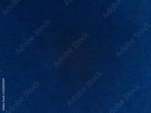 Deep cerulean textile surface showcasing a luxurious, uniform blue hue with subtle textural