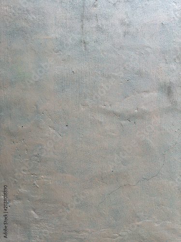 Patinaed surface displaying a serene blend of light blues and soft grays with subtle textures