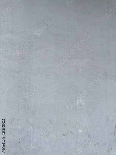 Subtle grey canvas revealing the quiet passage of time and faint surface imperfections