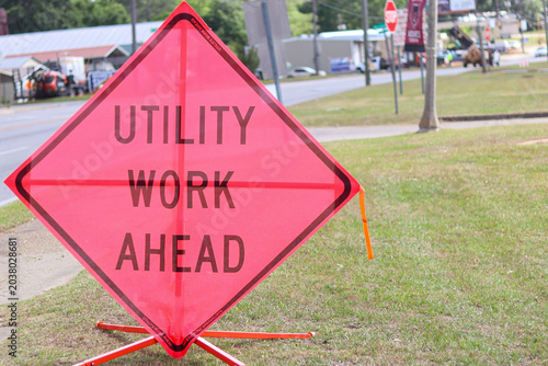 Utility Work Ahead Road Construction Warning Sign Near Street