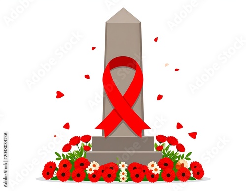 Commemorative monument with red ribbon and flowers. A gray obelisk monument stands on a pedestal, adorned with a bold red ribbon.  Red flowers and petals surround the base, creating a memorial scene
