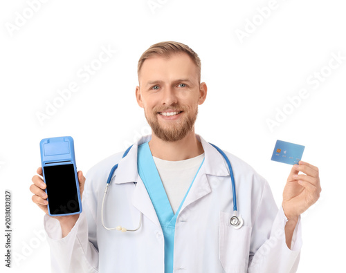 Male doctor with payment te...