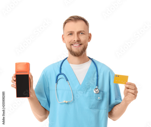 Male doctor with payment te...