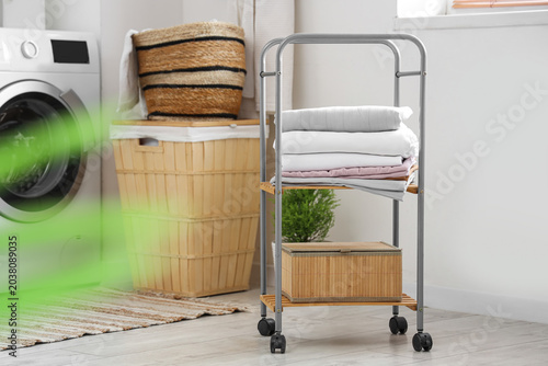 Stack of clean bed sheets o...