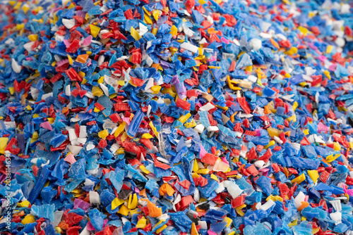 Bild auf Leinwand Plastic colorful pieces recycling shredded for industrial use.