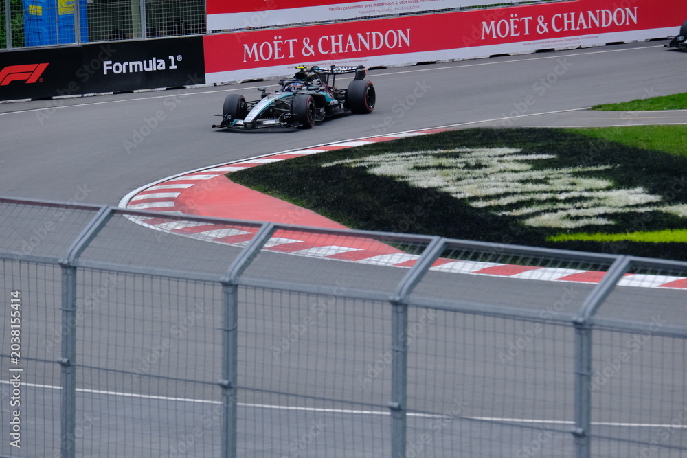 Obraz premium May 25, 2026, Montreal, Canada, Mercedes F1 car driven by Antonelli and Russell during Formula 1 action. g.
