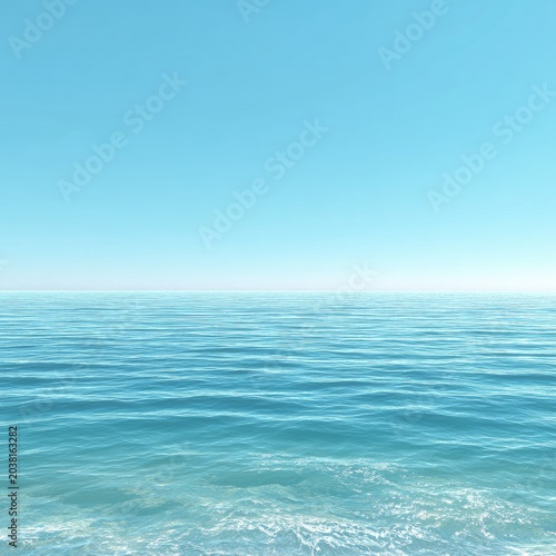 Calm ocean water meets clear blue sky at the horizon