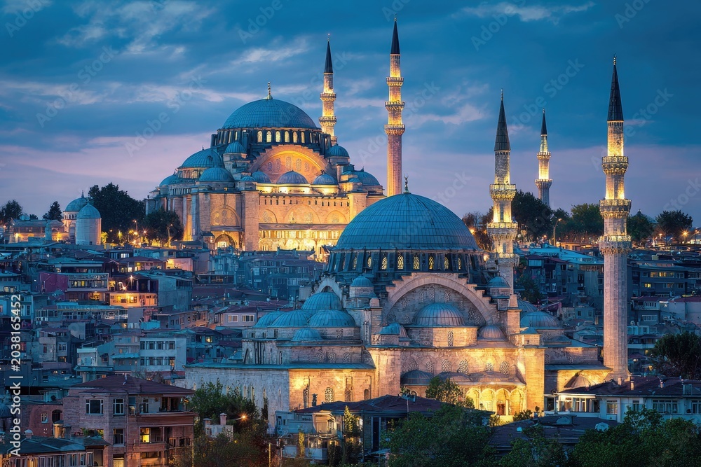 Obraz premium Majestic cityscape at twilight, illuminated mosques
