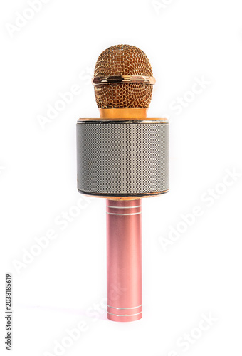 Wireless Bluetooth karaoke microphone and speaker in pink and gold, displaying front control buttons. Isolated on a plain white background for design.