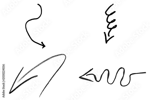 Set of black wavy hand drawn arrow shapes as isolated object