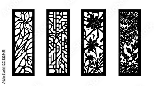 Four black rectangular panels with intricate, plant-inspired cut-out designs. Abstract floral and organic shapes