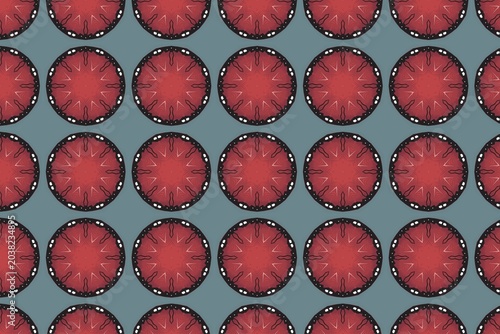 Close-up pattern of fresh red tomatoes arranged in grid on textured gray surface